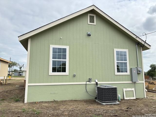 708 E 5th, Nixon, TX 78140 - rear view of property with central air condition unit