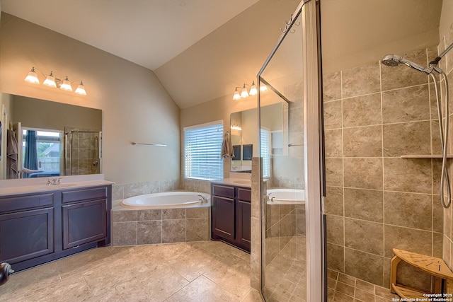 2097 Range Rd, Seguin, TX 78155 - full bath featuring a stall shower, two vanities, a bath, and lofted ceiling