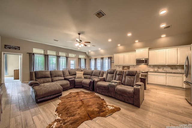 2097 Range Rd, Seguin, TX 78155 - living room with visible vents, ceiling fan, recessed lighting, and light wood-style floors