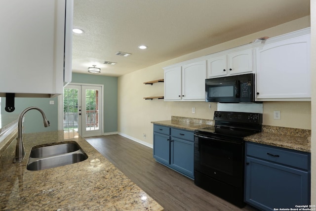 6819 Liberty Stone, San Antonio, TX 78244 - kitchen with black appliances, blue cabinets, a sink, dark wood-type flooring, and a textured ceiling