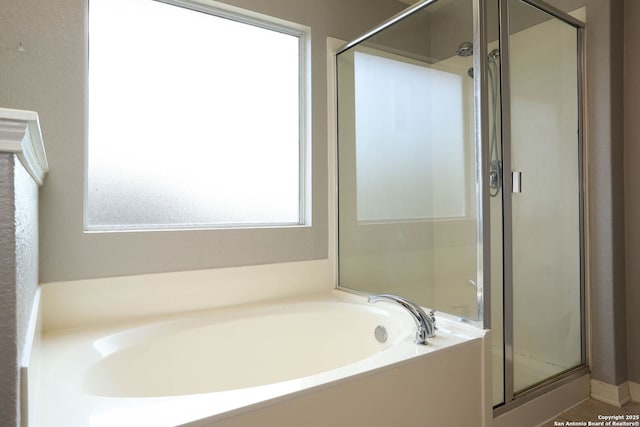 6819 Liberty Stone, San Antonio, TX 78244 - full bath with a shower stall and a garden tub