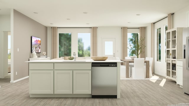 kitchen featuring a sink, appliances with stainless steel finishes, baseboards, light wood-type flooring, and a kitchen island with sink