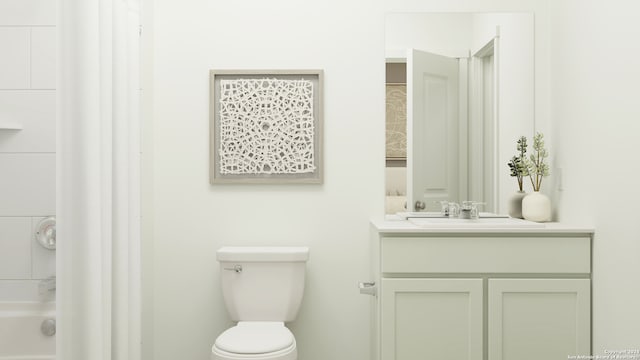 bathroom featuring toilet, vanity, and baseboards