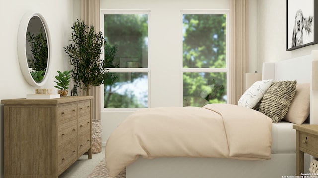 bedroom featuring carpet