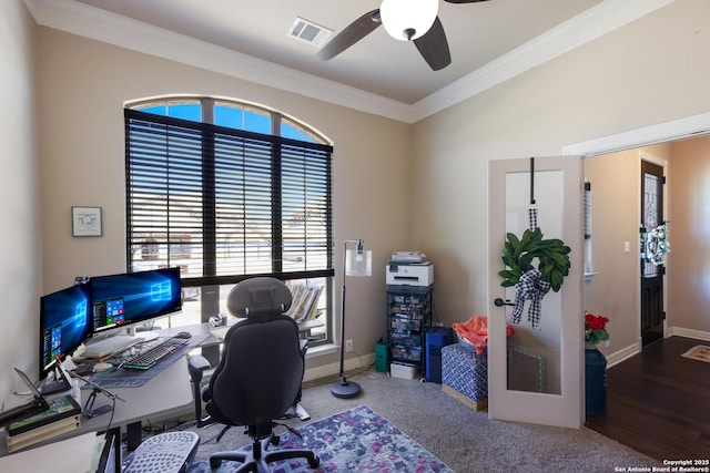 home office featuring baseboards, visible vents, ornamental molding, and a ceiling fan