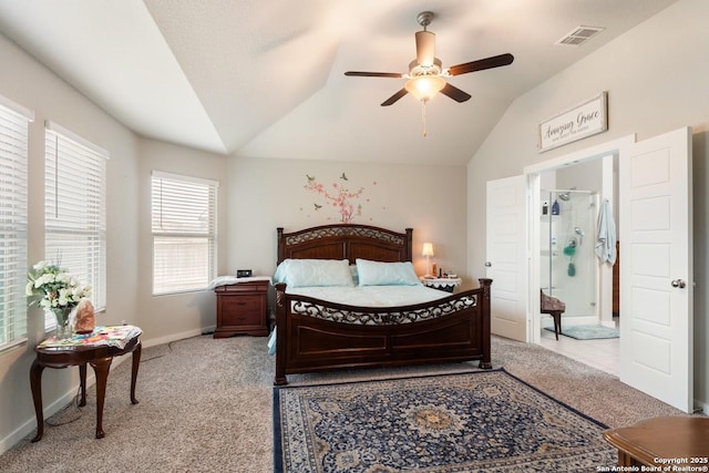 bedroom with baseboards, visible vents, light carpet, and lofted ceiling