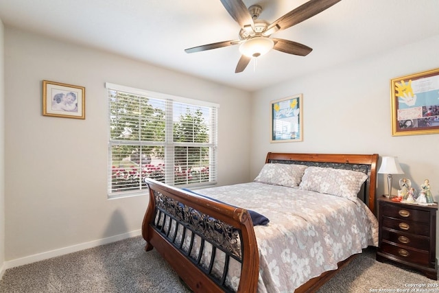 carpeted bedroom with baseboards and ceiling fan