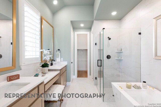 349 Hulda, New Braunfels, TX 78130 - bathroom with recessed lighting, a shower stall, marble finish floor, vanity, and a soaking tub