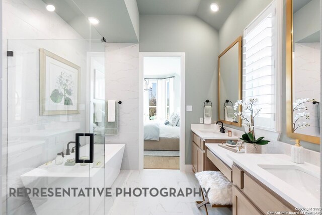 349 Hulda, New Braunfels, TX 78130 - full bath with a freestanding tub, a sink, ensuite bathroom, and plenty of natural light