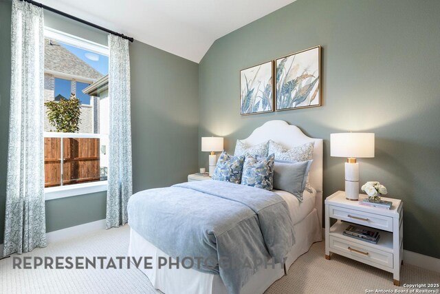 349 Hulda, New Braunfels, TX 78130 - bedroom with lofted ceiling, light colored carpet, and baseboards