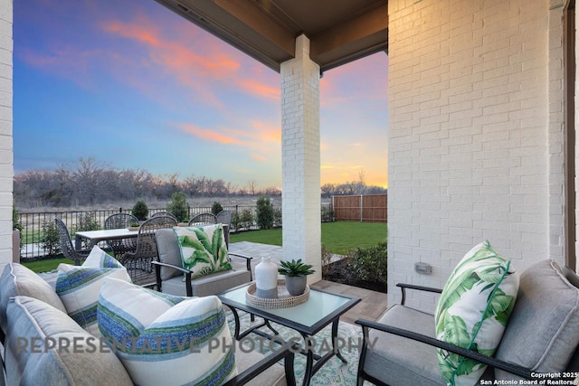 349 Hulda, New Braunfels, TX 78130 - patio terrace at dusk featuring outdoor lounge area and a fenced backyard