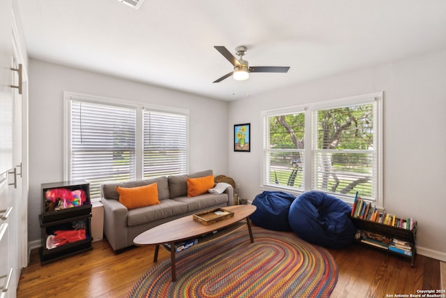 1013 Ivy Ln, San Antonio, TX 78209 - living area with a ceiling fan and hardwood / wood-style flooring