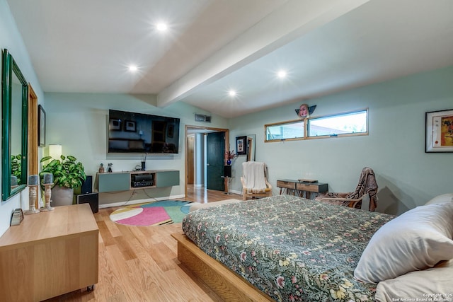 bedroom with lofted ceiling with beams, recessed lighting, and wood finished floors