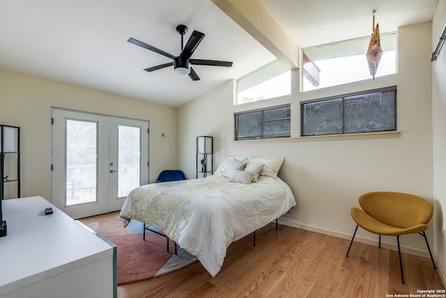 bedroom with lofted ceiling with beams, access to exterior, light wood-style flooring, and french doors