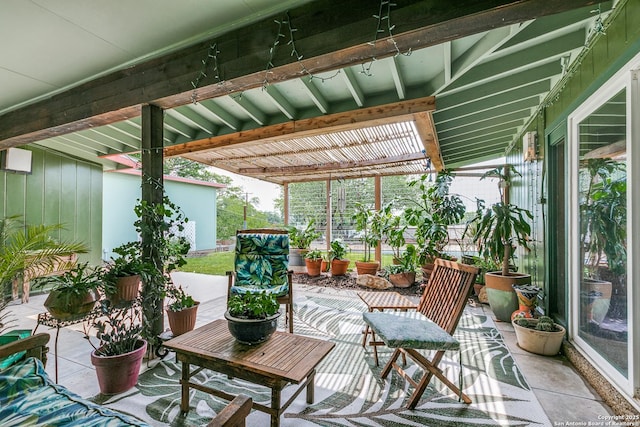 sunroom featuring a wealth of natural light