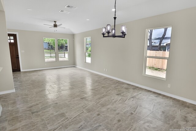 unfurnished dining area featuring recessed lighting, visible vents, baseboards, and ceiling fan with notable chandelier