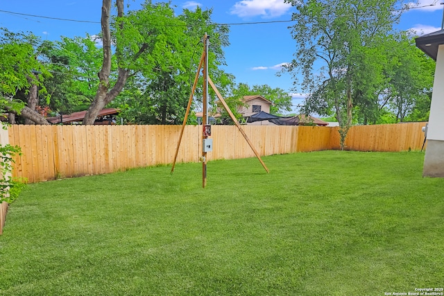 view of yard featuring a fenced backyard