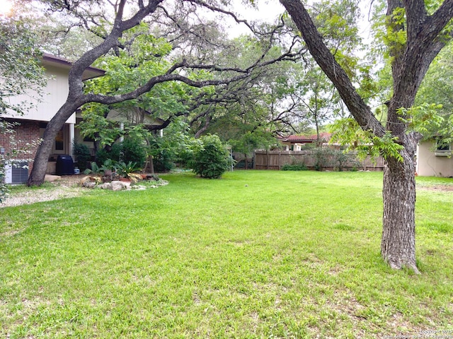 view of yard with fence