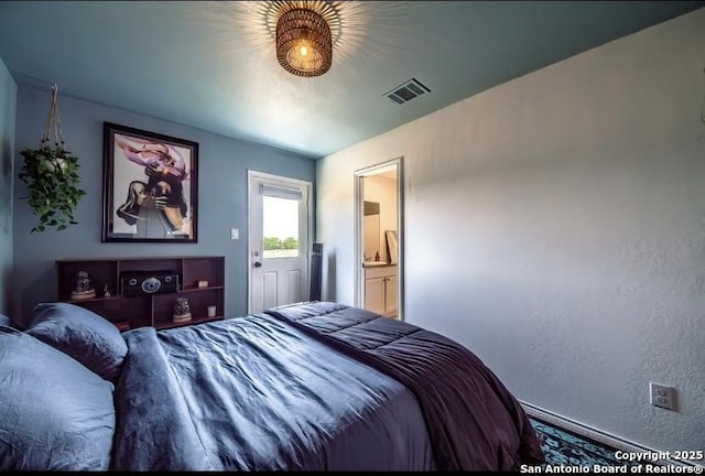 bedroom with visible vents