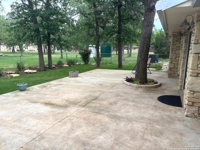 view of patio featuring fence private yard and central AC unit