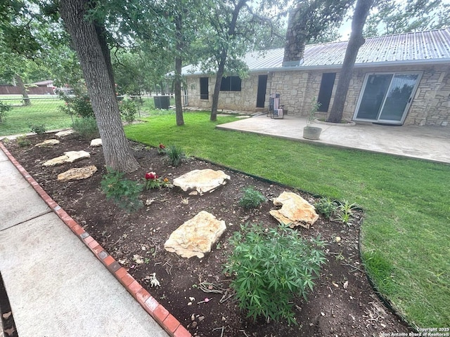 view of yard with cooling unit, a patio, and fence