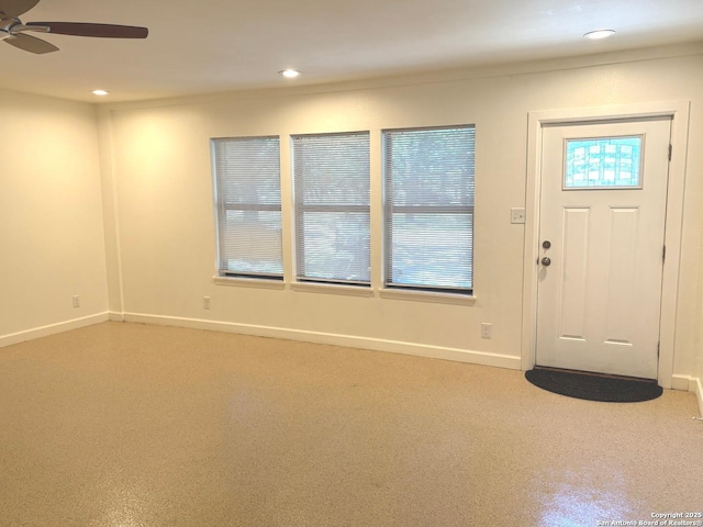 foyer entrance with ceiling fan, recessed lighting, and baseboards