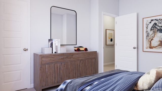 bedroom featuring baseboards