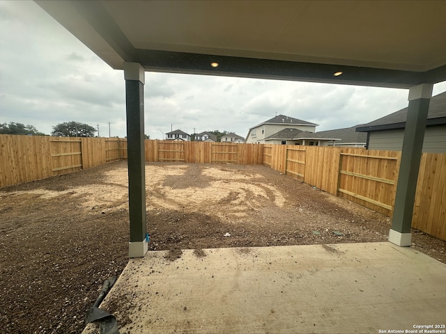 view of yard with a fenced backyard and a patio area