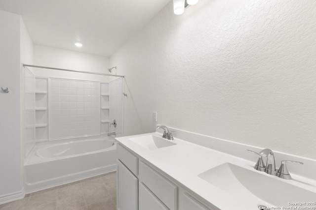 4770 Pico Pico St, San Antonio, TX 78222 - full bath featuring bathtub / shower combination, a textured wall, and double vanity