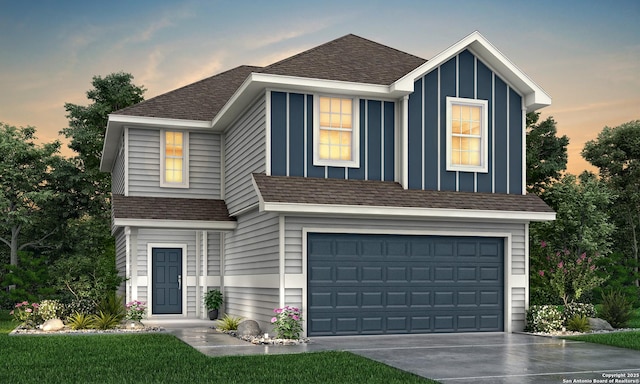 view of front facade featuring roof with shingles, board and batten siding, concrete driveway, and a garage