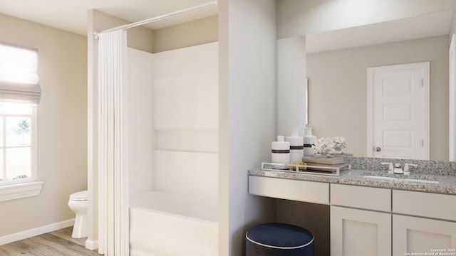 bathroom with wood finished floors, shower / bath combo, toilet, vanity, and baseboards
