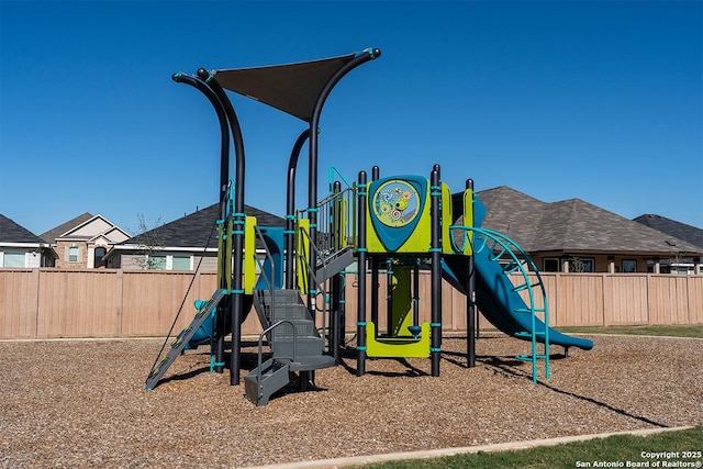 community play area featuring fence