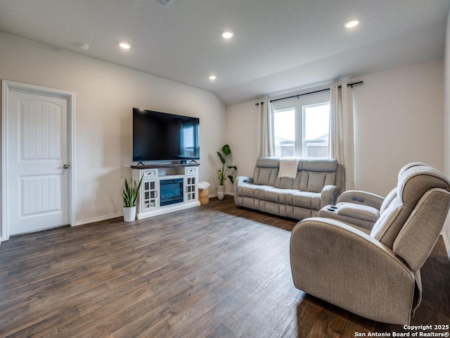 living room with baseboards, recessed lighting, and wood finished floors