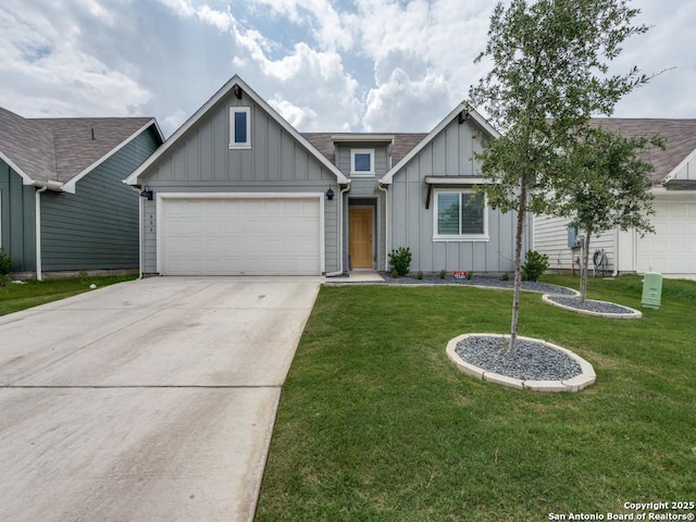 view of front of property with concrete driveway, a front yard, board and batten siding, and a garage