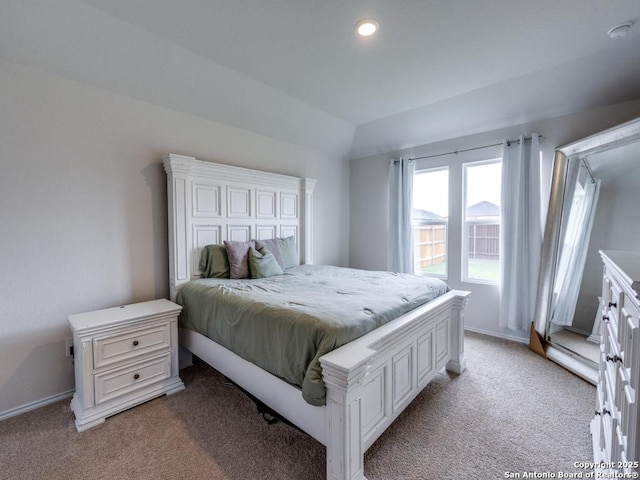 bedroom with recessed lighting, light colored carpet, and baseboards