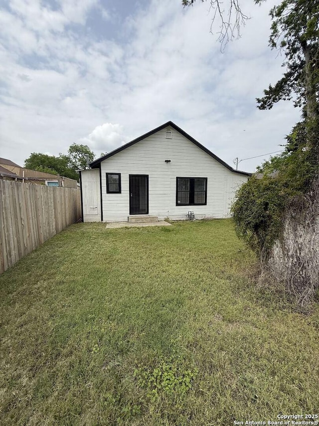 view of outdoor structure with fence