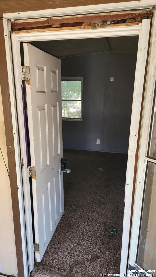 hall with carpet floors