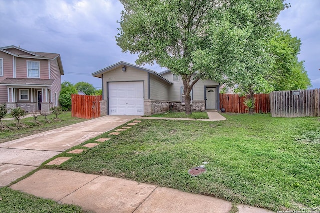 view of front of home with brick siding, fence, a garage, a front yard, and concrete driveway