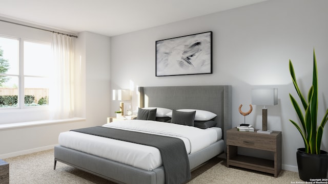 carpeted bedroom with baseboards and multiple windows
