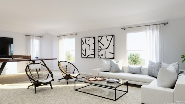 living room featuring lofted ceiling, carpet floors, and baseboards