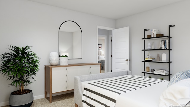 bedroom featuring light colored carpet and baseboards