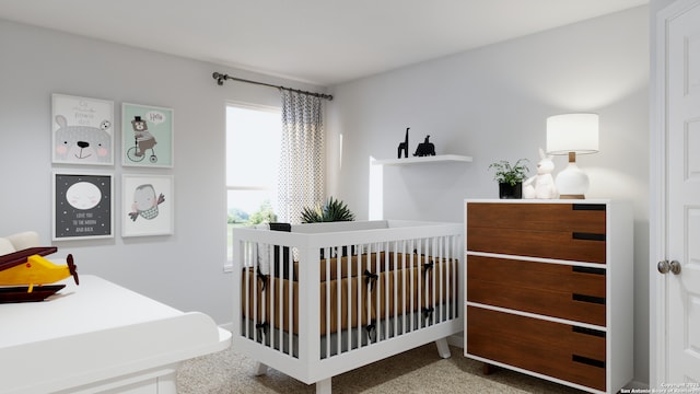 bedroom with carpet flooring and a nursery area