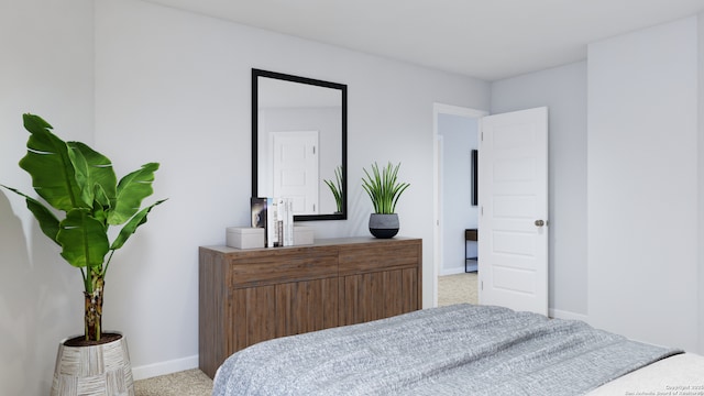 bedroom with baseboards and light carpet