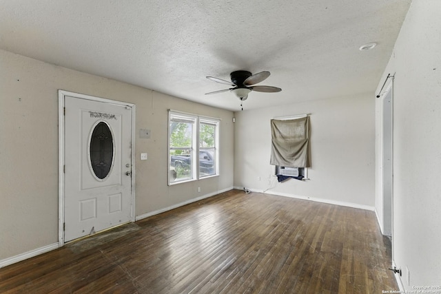 239 School Ave, New Braunfels, TX 78130 - entryway featuring a textured ceiling, ceiling fan, hardwood / wood-style floors, and baseboards