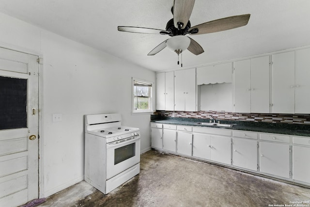 239 School Ave, New Braunfels, TX 78130 - kitchen with white electric stove, dark countertops, a sink, a ceiling fan, and concrete flooring