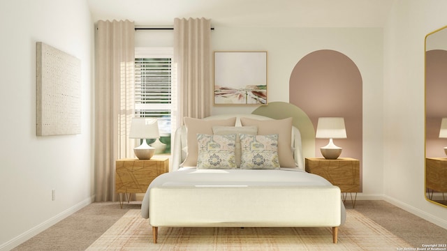 bedroom featuring carpet and baseboards