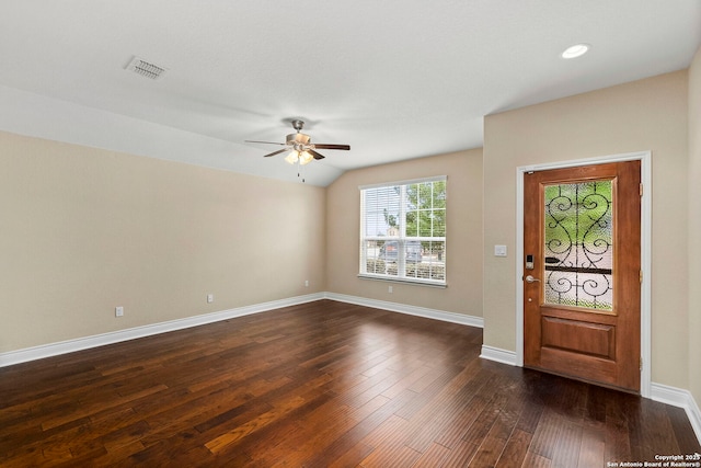 entrance foyer with visible vents, baseboards, ceiling fan, dark wood-style floors, and vaulted ceiling