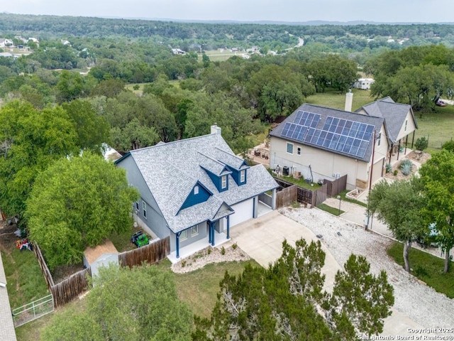 bird's eye view with a view of trees