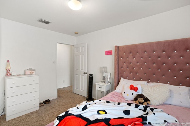 carpeted bedroom with visible vents