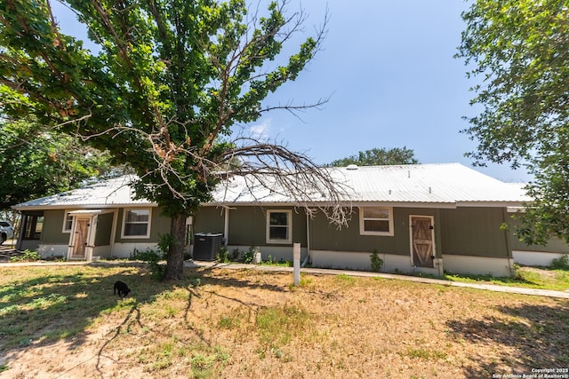 4843 Fm 1436, La Pryor, TX 78872 - ranch-style home with metal roof and central air condition unit